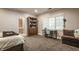 Comfortable bedroom with a study desk and attached bathroom, offering convenience and privacy at 110 Bow Ln, Indianapolis, IN 46220