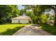 Stunning home with a well-manicured lawn, lovely landscaping, and a tree-lined driveway leading to tranquility at 110 Bow Ln, Indianapolis, IN 46220