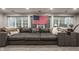 Spacious living room with a comfortable sectional sofa, perfect for relaxation and gatherings at 110 Bow Ln, Indianapolis, IN 46220