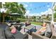 Inviting backyard deck overlooking the pond with ample seating and a serene ambiance for relaxation and gatherings at 11820 Stepping Stone Dr, Fishers, IN 46037
