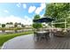 Beautiful backyard deck with tranquil pond views, ideal for outdoor living and entertaining guests at 11820 Stepping Stone Dr, Fishers, IN 46037