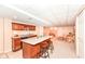 Basement rec room features a wet bar, offering a versatile space for entertaining guests and relaxing at home at 11820 Stepping Stone Dr, Fishers, IN 46037