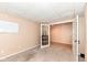 Neutral bedroom featuring carpeted floors, paneled ceiling, and French doors at 11820 Stepping Stone Dr, Fishers, IN 46037