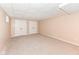 Neutral bedroom offers carpeted floors, paneled ceiling, and double door closets for ample storage at 11820 Stepping Stone Dr, Fishers, IN 46037