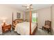Cozy bedroom with a four-poster bed, decorative pillows, and soft lighting for a relaxing atmosphere at 11820 Stepping Stone Dr, Fishers, IN 46037