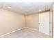 Neutral bedroom featuring carpeted floors, paneled ceiling, and single door at 11820 Stepping Stone Dr, Fishers, IN 46037