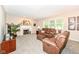 Comfortable living room features a fireplace and modern furnishings perfect for relaxing and entertaining guests at 11820 Stepping Stone Dr, Fishers, IN 46037