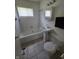 Standard bathroom featuring a tub and shower combination, white sink, and tiled floor at 1201 E Gimber St, Indianapolis, IN 46203