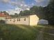 A well-kept house with a detached garage and beautiful surroundings at 1201 E Gimber St, Indianapolis, IN 46203