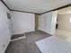 Spacious living room featuring fresh paint and a glimpse into the kitchen at 1201 E Gimber St, Indianapolis, IN 46203