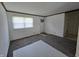 Bright living room with a window, fresh paint and new carpet provides a comfortable space at 1201 E Gimber St, Indianapolis, IN 46203