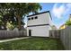 Well-maintained backyard features a fenced yard and modern exterior at 1405 E Vermont St, Indianapolis, IN 46201