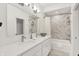 Bathroom with a double sink vanity and a shower-tub combination at 1405 E Vermont St, Indianapolis, IN 46201