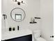 Bright bathroom with a double vanity, modern fixtures, and a toilet at 1405 E Vermont St, Indianapolis, IN 46201