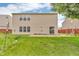 The backyard has a patio, grass, and ample space for outdoor activities and relaxation at 1449 Danielle Dr, Indianapolis, IN 46231
