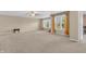 Spacious empty room with large windows, neutral walls, and carpet, offering great natural light at 1449 Danielle Dr, Indianapolis, IN 46231
