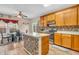 Bright kitchen featuring tile floors, an island, and stainless steel appliances at 1449 Danielle Dr, Indianapolis, IN 46231