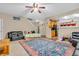 Spacious living room with an area rug, and open staircase to the upper level at 1449 Danielle Dr, Indianapolis, IN 46231