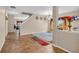 Open-concept living area with tile flooring and staircase at 1449 Danielle Dr, Indianapolis, IN 46231