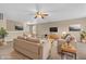 Virtually staged living room with couches, coffee table, and neutral walls at 1449 Danielle Dr, Indianapolis, IN 46231