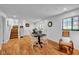 Spacious basement featuring a table and chairs, vinyl floors and a staircase to the upper floor at 1481 Wrenwood Dr, Columbus, IN 47201