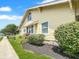 Charming single-Gathering home exterior with lush landscaping and street view at 1602 California St, Columbus, IN 47201