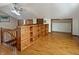 Spacious living room featuring hardwood floors and custom built-in shelving at 1602 California St, Columbus, IN 47201