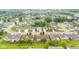 Aerial view of a residential neighborhood with ponds and tree-lined streets at 1605 Leisure Way, Greenfield, IN 46140