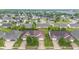 Aerial view of a residential neighborhood with tree-lined streets at 1605 Leisure Way, Greenfield, IN 46140