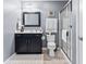Bathroom with single sink vanity and glass shower enclosure at 1605 Leisure Way, Greenfield, IN 46140