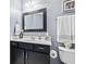 Bathroom features a framed mirror and a single sink vanity at 1605 Leisure Way, Greenfield, IN 46140