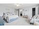 Carpeted bedroom with ceiling fan and decorative accents at 1605 Leisure Way, Greenfield, IN 46140