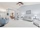 Open concept living room with dining area and views of the kitchen at 1605 Leisure Way, Greenfield, IN 46140