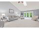 Bright living room with neutral colors and plenty of comfortable seating at 1605 Leisure Way, Greenfield, IN 46140