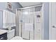 Bathroom features a glass shower enclosure with shelves at 1605 Leisure Way, Greenfield, IN 46140