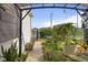 Cozy backyard garden patio with privacy fence and green foliage at 2017 Shadow Creek Blvd, Columbus, IN 47201