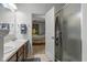Bathroom with a walk-in shower, and double sinks at 2017 Shadow Creek Blvd, Columbus, IN 47201