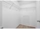 Walk-in closet with wire shelving and neutral carpet at 2017 Shadow Creek Blvd, Columbus, IN 47201