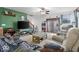 Relaxing living room featuring modern decor, comfortable seating, and natural light from sliding glass door at 2017 Shadow Creek Blvd, Columbus, IN 47201