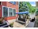Inviting backyard features cozy seating with a patio and string lights at 2263 Glebe St, Carmel, IN 46032