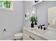Modern bathroom with stylish vanity, a sleek faucet, and a decorative mirror at 2263 Glebe St, Carmel, IN 46032
