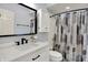 Bathroom featuring a modern vanity with a white countertop and storage cabinet at 2263 Glebe St, Carmel, IN 46032