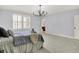 Light-filled bedroom with plush carpeting, shuttered windows, and light paint at 2263 Glebe St, Carmel, IN 46032