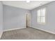 Bedroom with plush carpeting and a shuttered window at 2263 Glebe St, Carmel, IN 46032