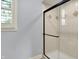 Bathroom showing a modern glass-enclosed shower with tiled walls at 2263 Glebe St, Carmel, IN 46032