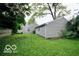 Backyard with a green lawn that has some trees at 2305 Barnor Dr, Indianapolis, IN 46219