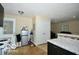 Kitchen area featuring white appliances, ample storage, and easy access to living spaces at 2305 Barnor Dr, Indianapolis, IN 46219