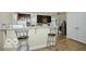 Kitchen with breakfast bar, sleek cabinets, and modern finishes for stylish dining at 2305 Barnor Dr, Indianapolis, IN 46219