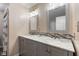 Bathroom with double sink vanity, marble countertops, and decorative backsplash at 2750 Chamberlin Dr, Indianapolis, IN 46227