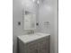 Updated bathroom featuring a vanity with gray cabinets and white countertop at 2750 Chamberlin Dr, Indianapolis, IN 46227